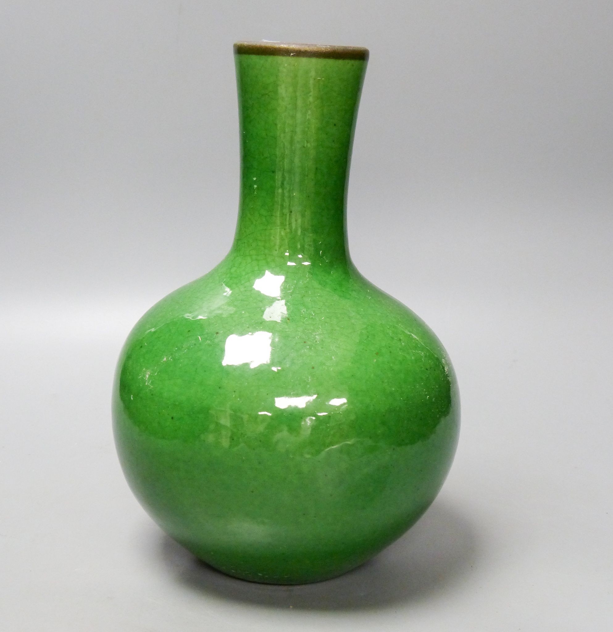 A Chinese green crackle glaze monochrome bottle vase, 24 cm high